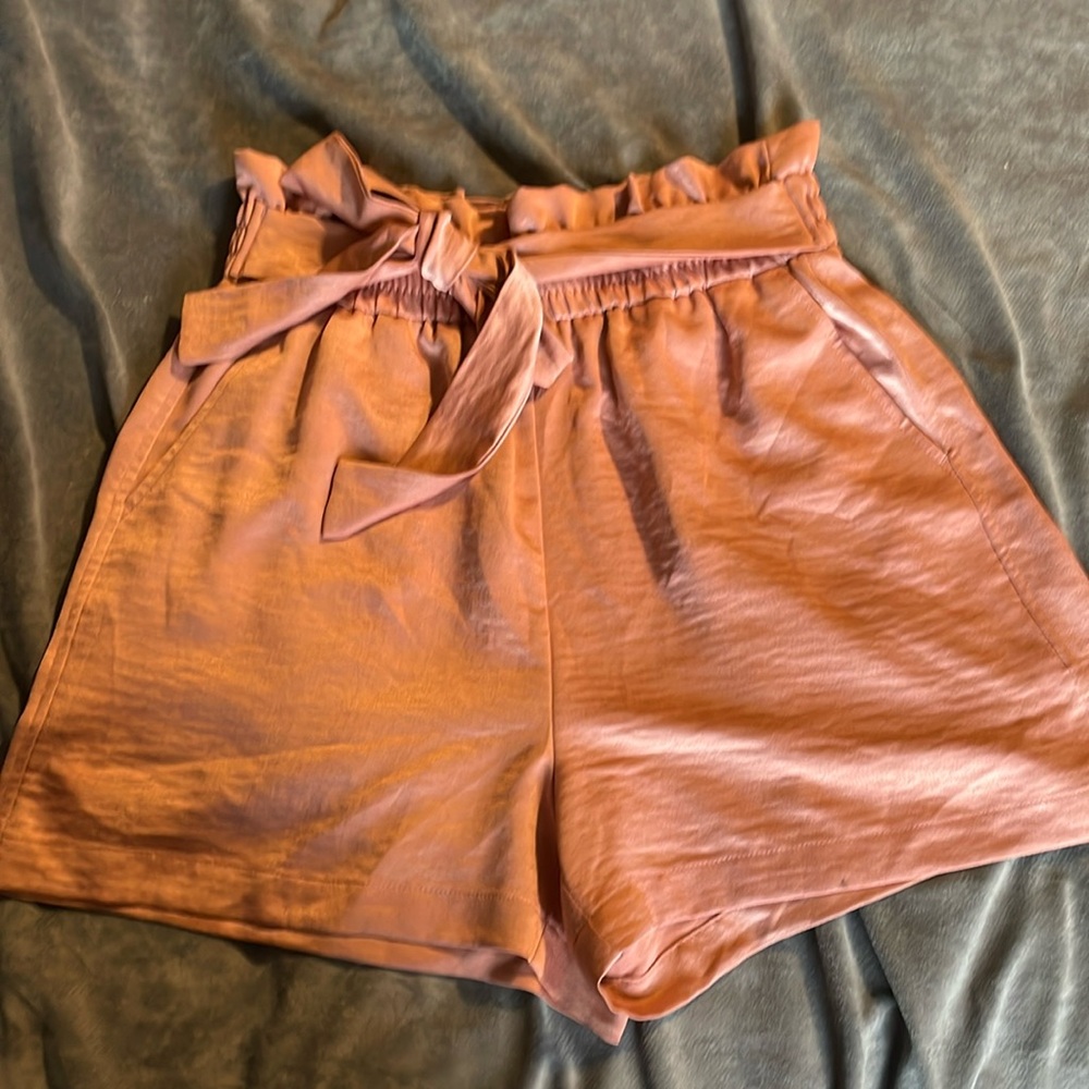 Jennifer Lopez size small rose pink shorts